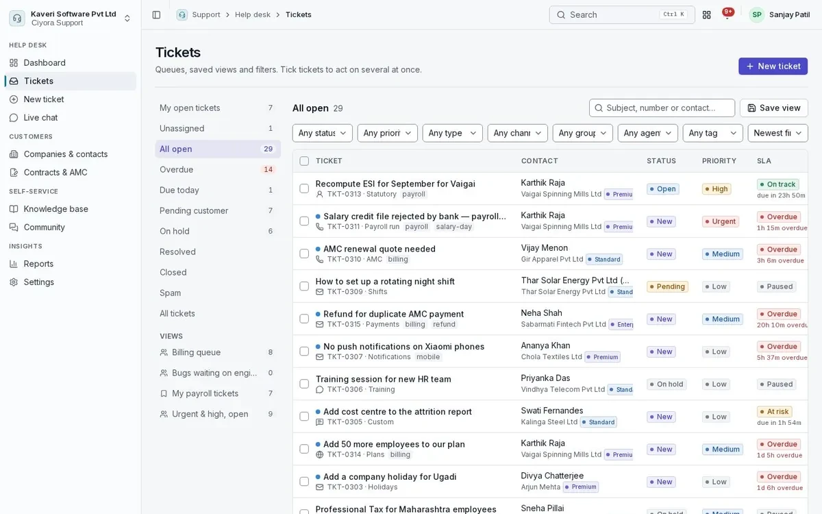 Support tickets list with saved views, filters, contacts, status, priority and SLA timers.